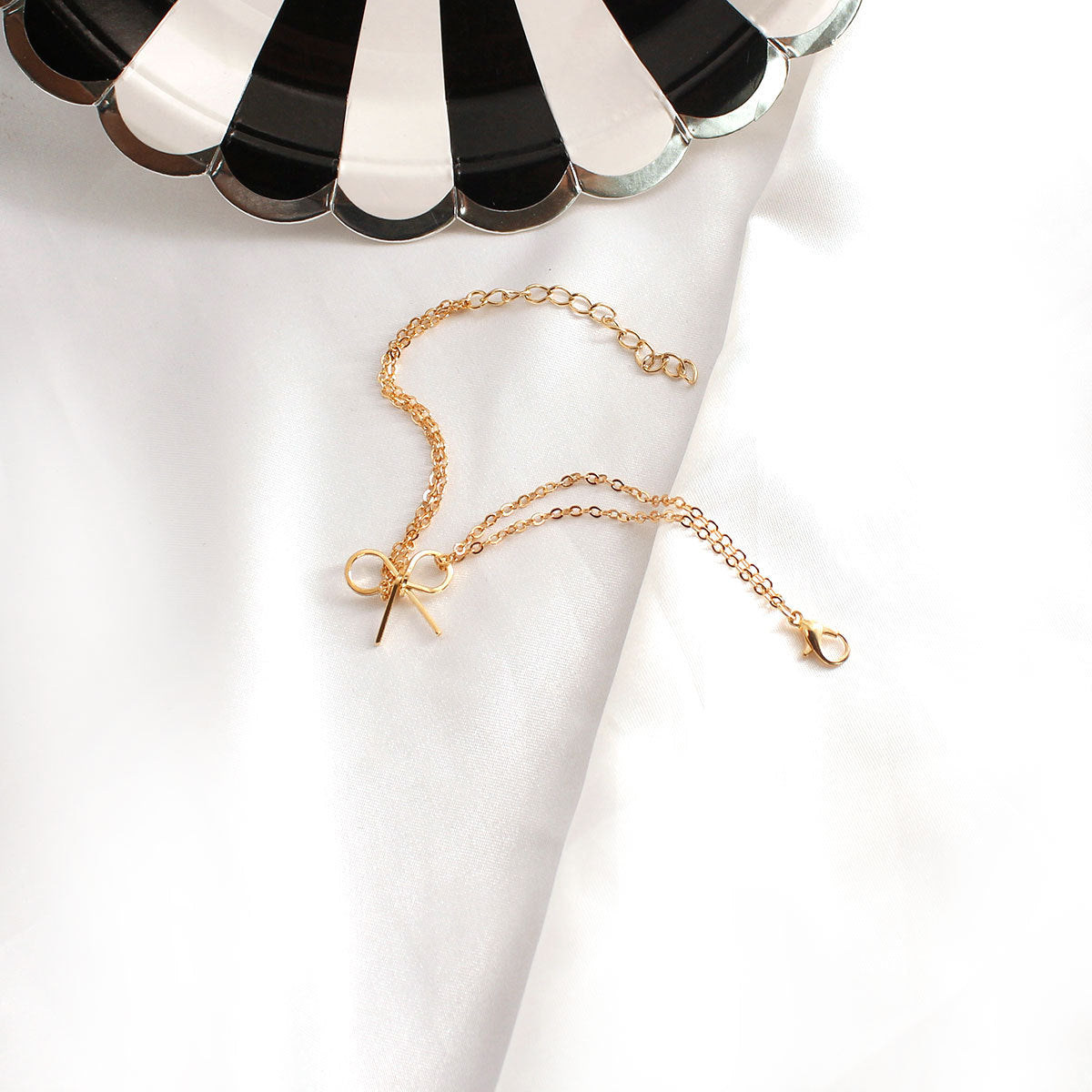 Golden Bow Charm Bracelet