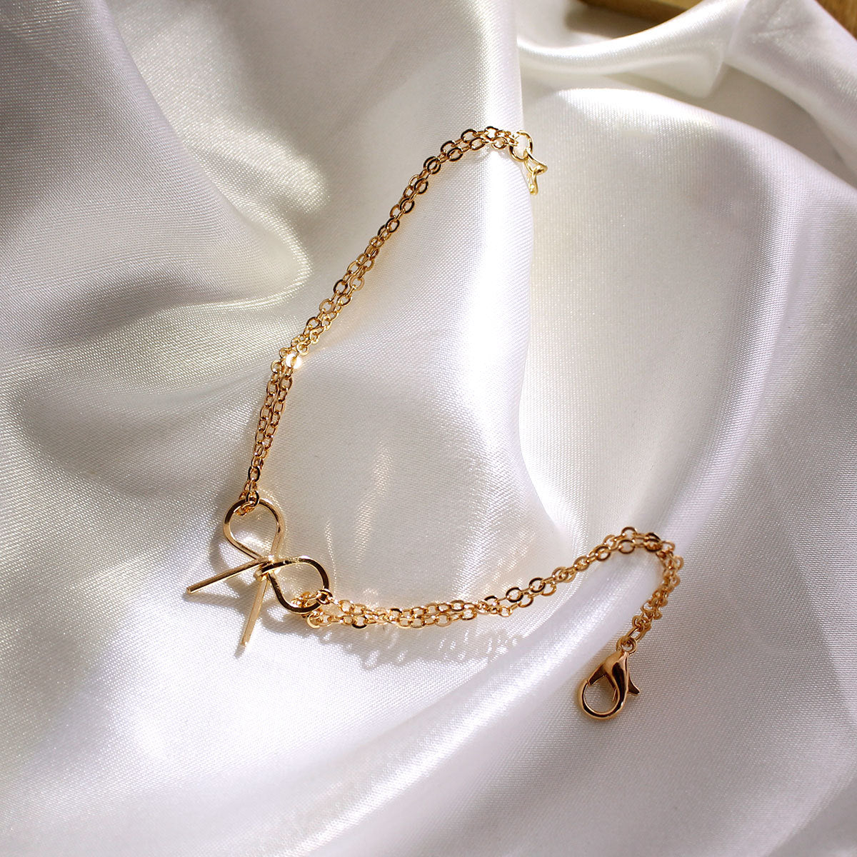 Golden Bow Charm Bracelet