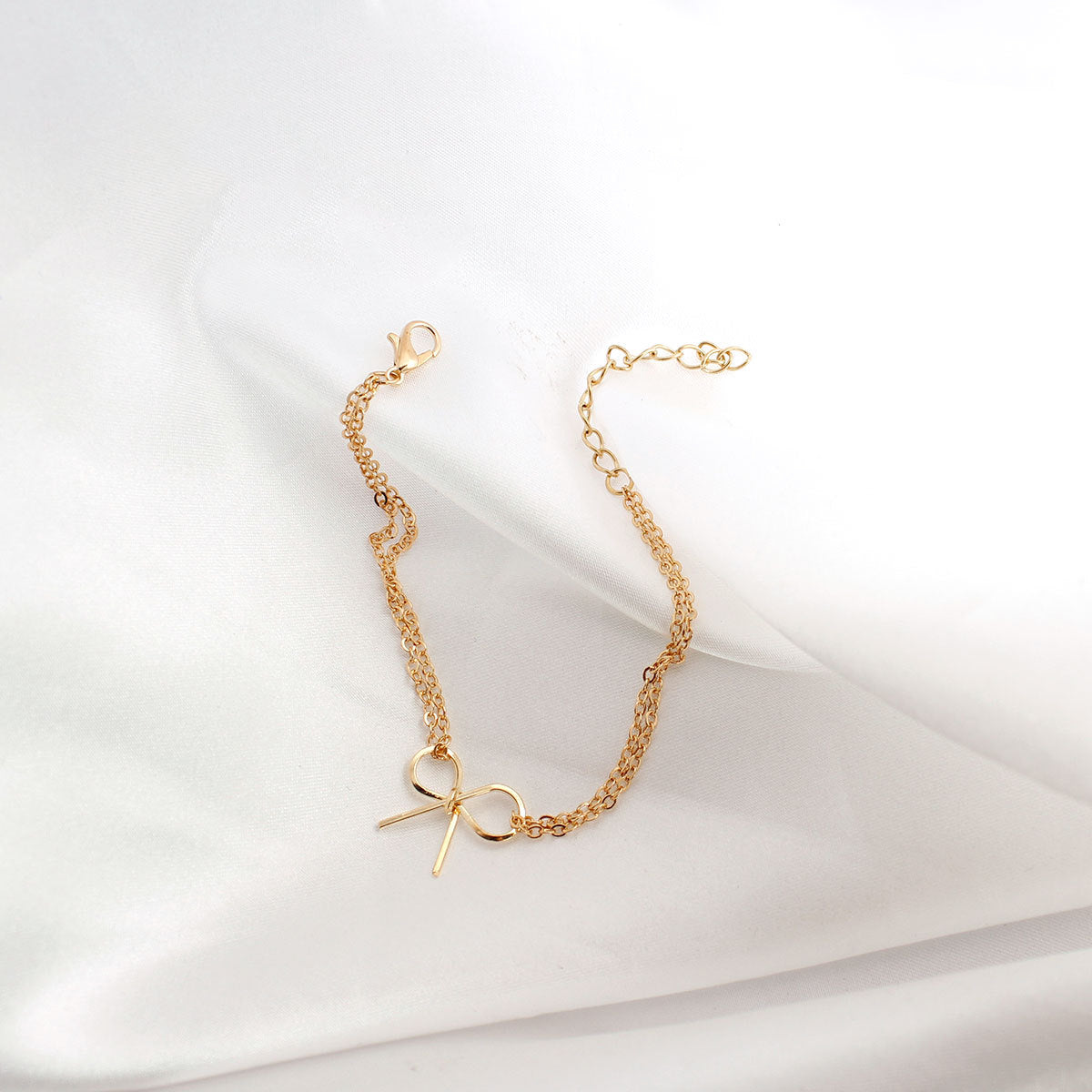 Golden Bow Charm Bracelet